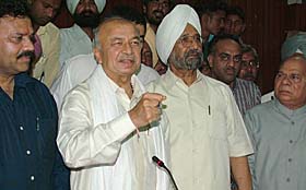 Mr Sushilkumar Shinde, Union Power Minister, addresses party workers in Jalandhar on Saturday. 