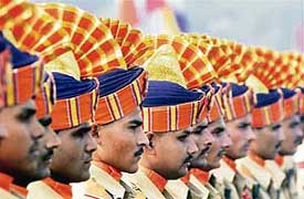 Central Reserve Police Force personnel take part in the 67th anniversary parade in New Delhi on Saturday. 