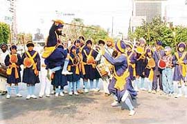 A group of Nihangs display skills on the eve of Aagman Purb of Guru Nanak Dev ji in Ludhiana