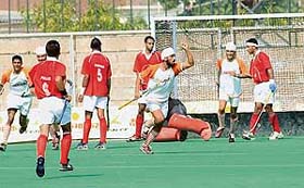 Sher Singh of the Namdhari team celebrates after converting a penalty corner during the super league match against Punjab in the 62nd National Hockey Championship at the Olympian Surjit Hockey Stadium in Jalandhar