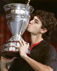 Croatias Mario Ancic kisses the trophy after beating Swedens Thomas Johansson in the final of the St Petersburg Open tennis tournament
