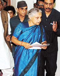 Delhi Chief Minister Sheila Dikshit proceeds to attend the winter session of the Assembly
