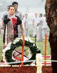 Congress President Sonia Gandhi offers floral tributes at Shakti Sthal on the occasion of the death anniversary of former Prime Minister Indira Gandhi in New Delhi on Tuesday. 