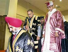 PAU Vice-Chancellor Dr K.S. Aulakh leads Governor S.F. Rodrigues and Union Finance Minister P. Chidambaram to the universitys convocation in Ludhiana on Tuesday.