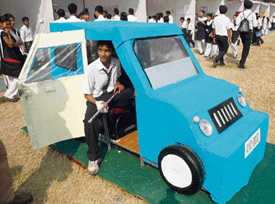 Nitin informs visitors about his inventions significance at the State Science Exhibition held at GMSSS, Sector 37, Chandigarh, on Wednesday.