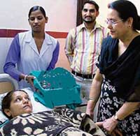 Dr Sarbjit Kaur Grewal with the patient at SAS Grewal Hospital in Ludhiana on Wednesday.