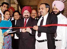 Justice R.S. Mongia, president of the State Consumer Disputes Redressal Commission, Punjab, inaugurates the office of the Consumer Forum on the Judicial Complex in Ludhiana on Wednesday.