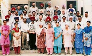 Staff of Global Public School, Kaullgarh, after a felicitation function on Wednesday.