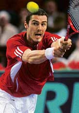 Russias Marat Safin returns the ball to Swedens Robin Soderling during their Paris Tennis Masters Series second round match at Bercy indoor tournament on Tuesday. Safin won 3-6, 6-3, 6-4.