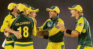 Australian players celebrate after beating New Zealand in the first semifinal of the Champions Trophy in Mohali on Wednesday.