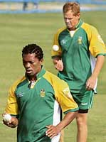 South African pacers Makhaya Ntini and Shaun Pollock attend a practice session in Jaipur