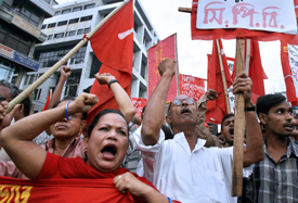 Communist Party of Bangladesh (CPB) activists shout slogans during a demonstration in Dhaka on Wednesday.