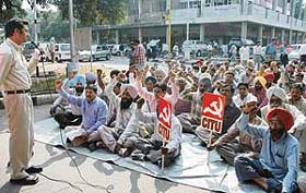 CITU members hold a protest rally in front of the Deputy Commissioners office in Chandigarh