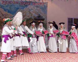 Kinnauri men and women present a local dance in the tribal festival that concluded at Reckong Peo in Kinnaur