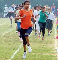 Arshvir Kaur Grewal in action in 200-m race in the annual athletics meet of Sacred Heart Convent Senior Secondary School, Sarabha Nagar, Ludhiana, on Thursday