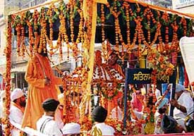 A nagar kirtan being taken out ahead of Guru Nanak Devs birth anniversary in Ludhiana on Thursday
