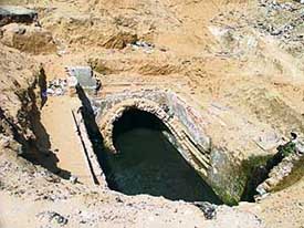 The caved-in road in the Model Town area, Ludhiana, on Thursday