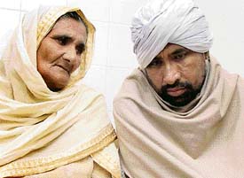 Mr Gurmail Singh, who is suffering from renal failure, along with his mother Gurcharan Kaur at the PGI, Chandigarh.