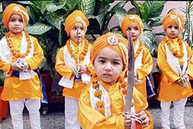 Students of Kiddies Paradise School dressed up as Panj Piyaras as part of Gurpurb celebrations at the school in Ludhiana on Saturday
