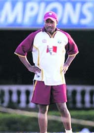 West Indies captain Brian Lara inspects the pitch