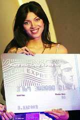 A model launches "The Platinum Club" card of American Express in New Delhi