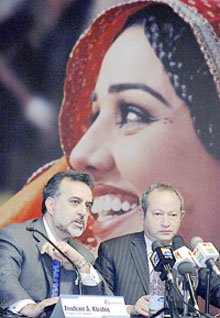Mr Zouhair A. Khaliq, Chief Executive and President of Mobilink, with Chairman of Orascom Telecom Naguib Sawiris at a news conference in Islamabad