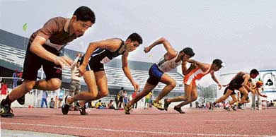 Boys in action in the 100-m sprint at the 52nd Punjab State Schools Athletics Meet in Ludhiana on Tuesday
