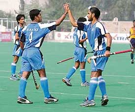 SAI players celebrate a goal against EME Jalandhar during the 23rd Indian Oil Surjit Hockey Tournament in Jalandhar on Tuesday