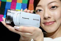 A model of Matsushita Electric Industrial, known by its Panasonic brand, shows off the new 3CCD high-definition (HD) digital camcorder "HDC-SD1" in Tokyo