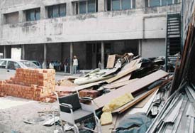 Heaps of solid waste, construction material and damaged hospital equipment outside the morgue at the PGI, Chandigarh.