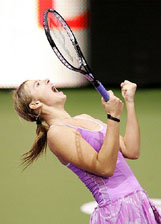 Maria Sharapova of Russia celebrates after beating compatriot Elena Dementieva during the WTA championships in Madrid on Tuesday.