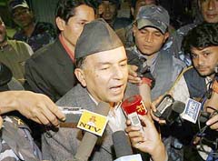 General Secretary of Nepalese Congress Ram Chandra Paudel talks to mediapersons after signing a pact with the Maoists in Kathmandu