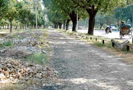 Work on laying a cycle track on the road separating Sectors 18 and 21 in Chandigarh has still not been completed