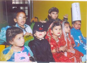 Children participate in a fancy dress show at Kids Day Out