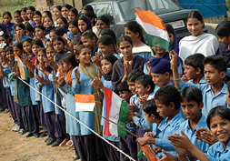 Students of Government Elementary School, Ratipur, wait for the Punjab CM in the Koomkalan constituency on Thursday.