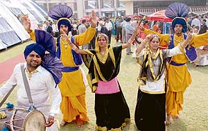 Artistes accord a traditional welcome to delegates attending a three-day annual convention organised by the Federation of Hotel and Restaurant Associations of India at Hotel Mountview in Chandigarh on Friday. 