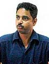 Rajinder Singh, an alleged deaf-and-dumb snatcher, tries to explain his story through sign language at the Sector 17 police station. 