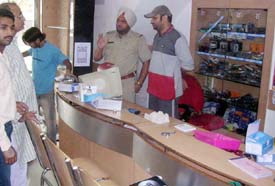 The showroom which was burgled in Mandi Ahmedgarh on Thursday night