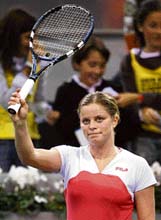 Belgiums Kim Clijsters rejoices after beating Russias Svetlana Kuznetsova in the quarterfinal of the WTA Tour Championship at the Rockodromo Arena Stadium in Madrid on Thursday. Clijsters won 6-1, 6-1. 