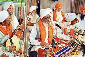 Bhai Lal, a descendant of Bhai Mardana, performs at a kirtan darbar in Dera Bassi on Friday night.