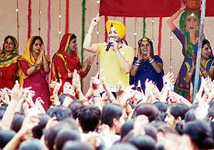 Punjabi singer Inderjit Nikku entertains students of Master Tara Singh College for Women, Ludhiana, at the Virasat Mela on Saturday. 
