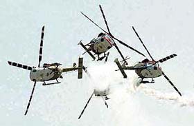 Indian Air Force (IAF) advanced light helicopters. Sarang, perform during an air show organised as a part of IAFs platinum jubilee celebrations at Sardar Patel airport in Ahmedabad