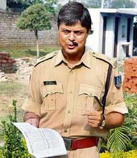 CRPF commandant Shiv Charan Jha, who has vowed to keep half of his moustache shaved until he gets justice at a press conference in Jammu on Saturday. He was suspended from service a year ago on ground of being mentally imbalanced