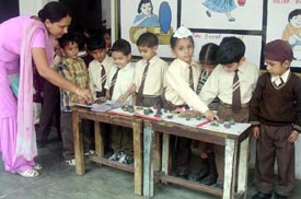 Students of SVM Senior Secondary School, Ahmedgarh, display artefacts