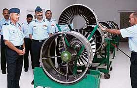 Air Officer Commanding-in-Chief, Western Air Command, Air Marshal A.K. Singh (left) being briefed about the MiG-29 engines during his visit to the Air Force Station High Grounds in Chandigarh on Monday.