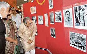 Haryana Chief Minister Bhupinder Singh Hooda, accompanied by Union Minister for Social Justice and Empowerment, Mrs Meira Kumar, takes a look at the photo exhibition on the life of Babu Jagjivan Ram at the Haryana Vidhan Sabha in Chandigarh on Monday.