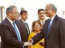 Foreign Secretary Shiv Shankar Menon receives his Pakistani counterpart Riaz Mohammad Khan at the IGI Airport in New Delhi on Monday. 