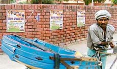 A wall of the Punjab State Legal Services Authority defaced by Congress leaders in view of the Prime Ministers rally in Ludhiana on Tuesday.