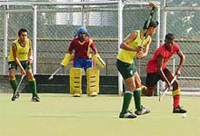 A match in progress between the Jarkhar Academy and the Bahadurgarh Academy in the qualifying round of the 5th All-India Jagtar Singh Memorial Hockey Tournament at the PAU stadium on Monday.