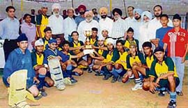 The hockey team of Guru Nanak Model Senior Secondary School, Doraha, with the winners cup during the 8th Dr Ishwar Singh Memorial Divali Hockey Tournament at Doraha on Sunday.